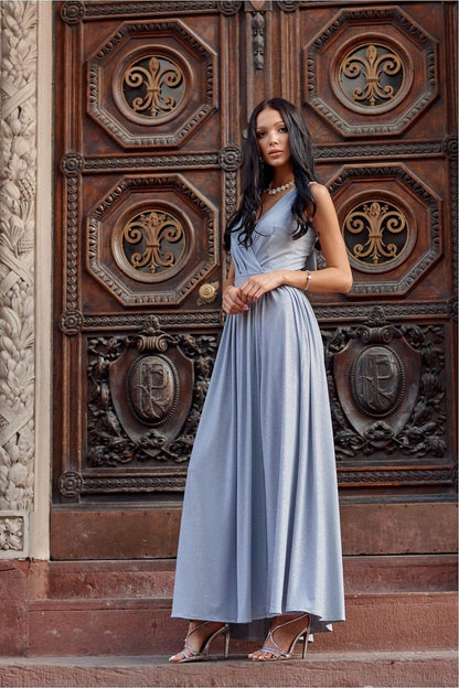 Roco Fashion long sleeveless V-neck dress in light blue with pleated skirt and side slit.