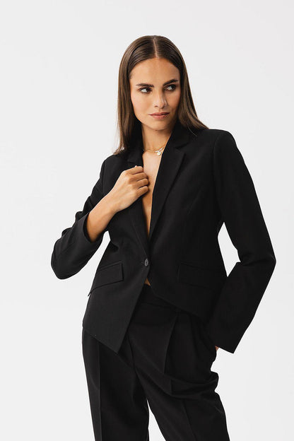 Women's asymmetrical jacket, black, single-button front, notch lapels, long sleeves
