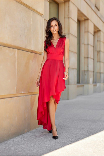 Red evening dress with V-neckline, sleeveless bodice, and asymmetrical layered hem