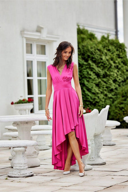 Pink evening dress with sleeveless V-neck and flowing asymmetrical skirt hem